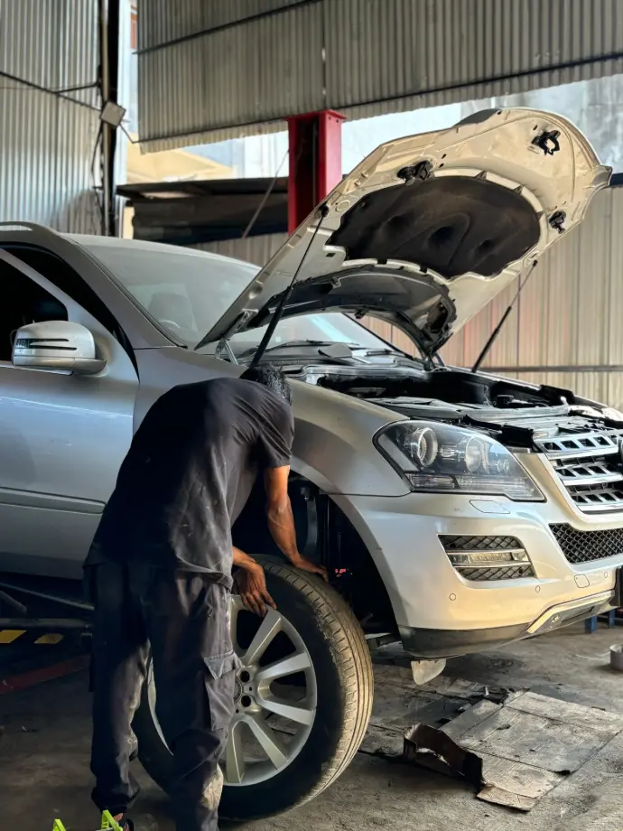 Vehicle is getting repair by the Mechanic